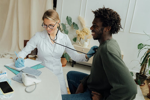 Doctor checking on patient