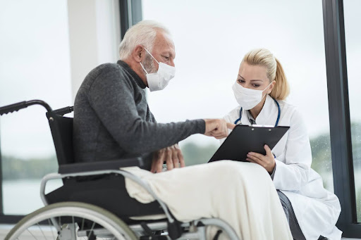 Doctor with elderly patient